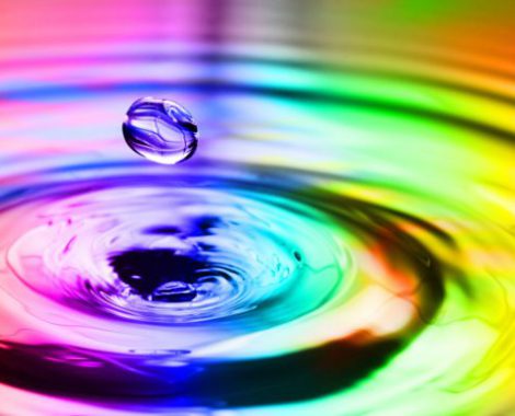 5148390 - colorful splash with round drops macro